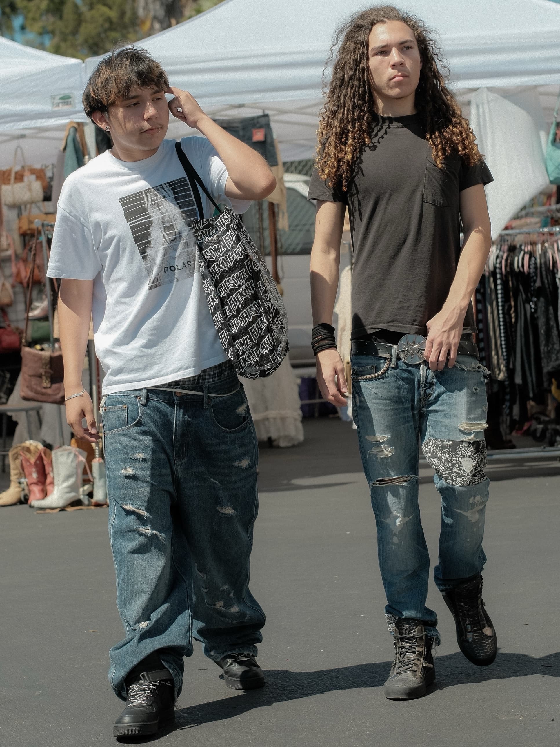 Graphic tee and brown pocket tee, distressed baggy jeans