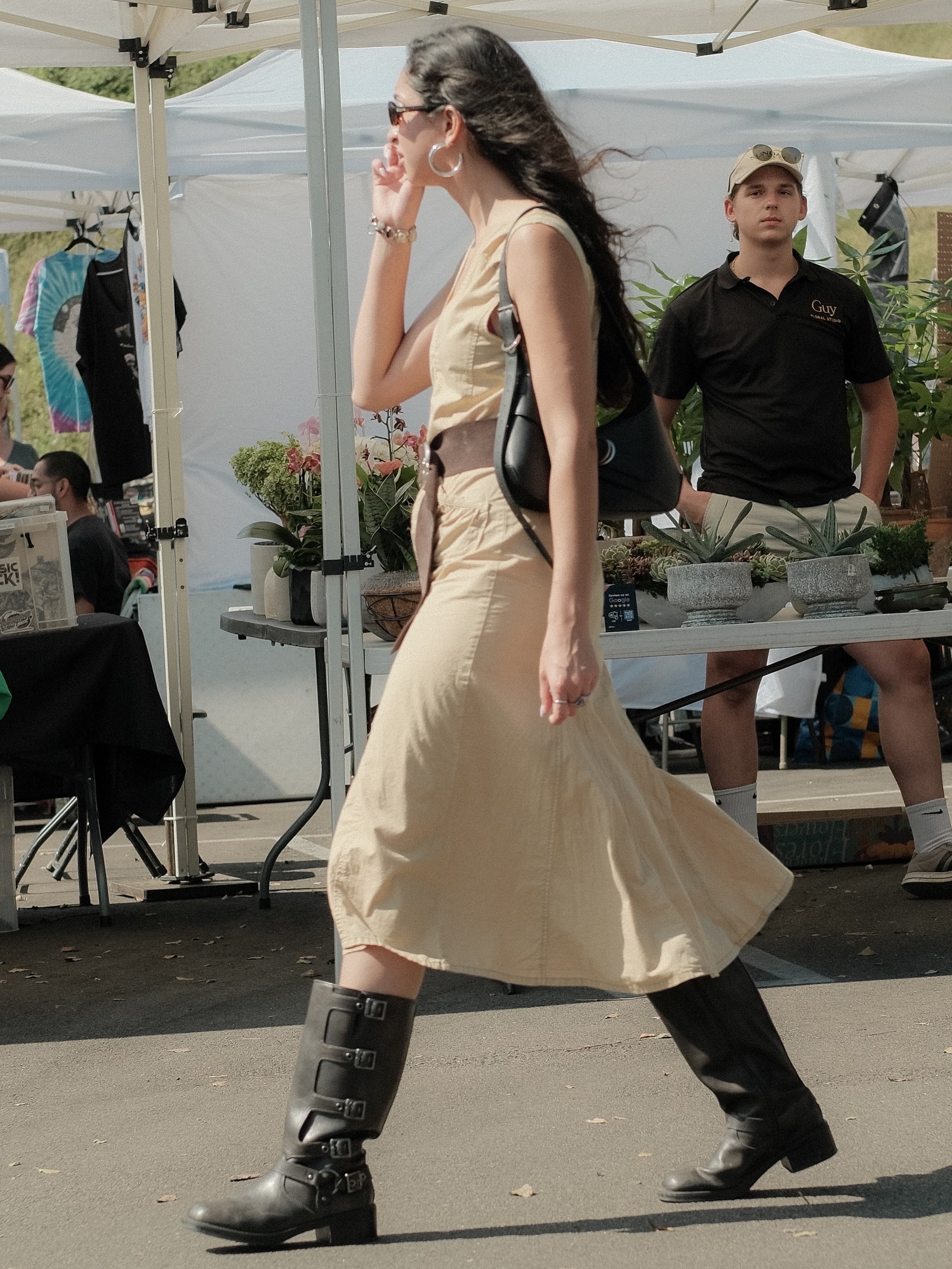Sleeveless khaki midi shirtdress, brown belt, black buckle boots, at Spinning Sunset