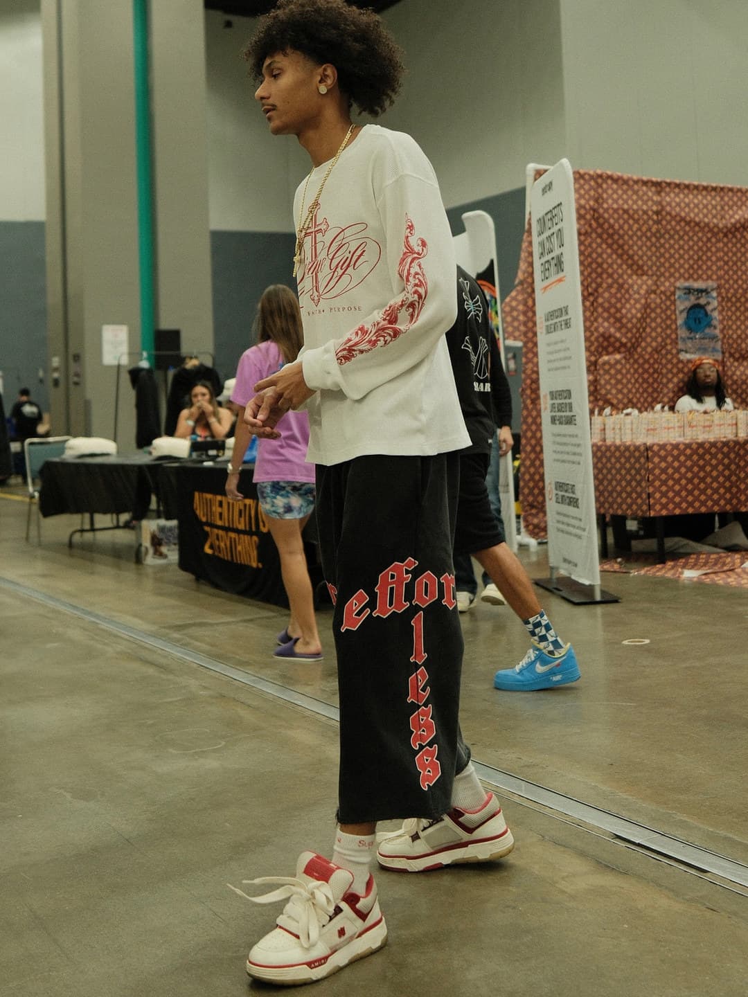 White long-sleeve, black printed wide sweatpants