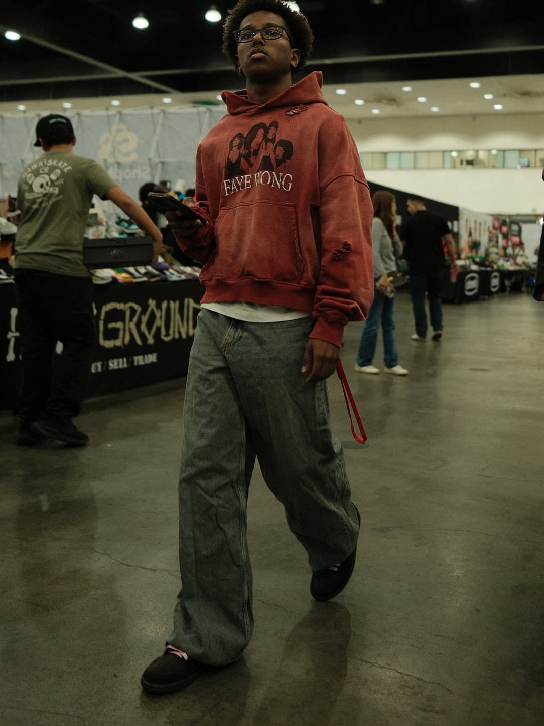 Faded red graphic hoodie, wide sage jeans