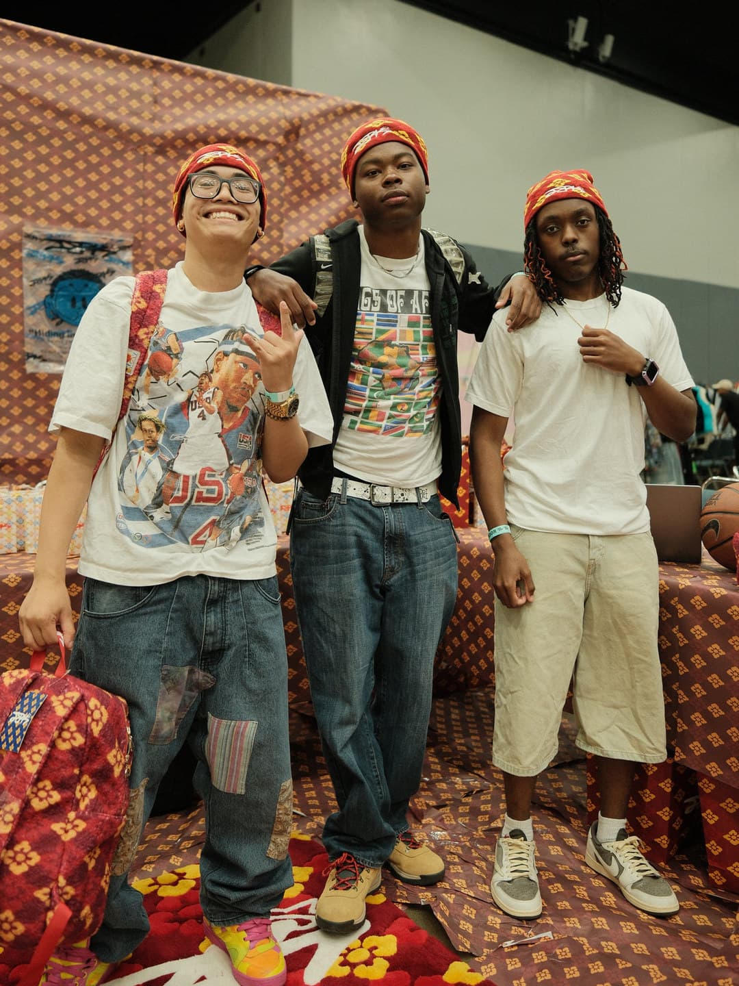 Matching red bandanas, graphic tees and light denim